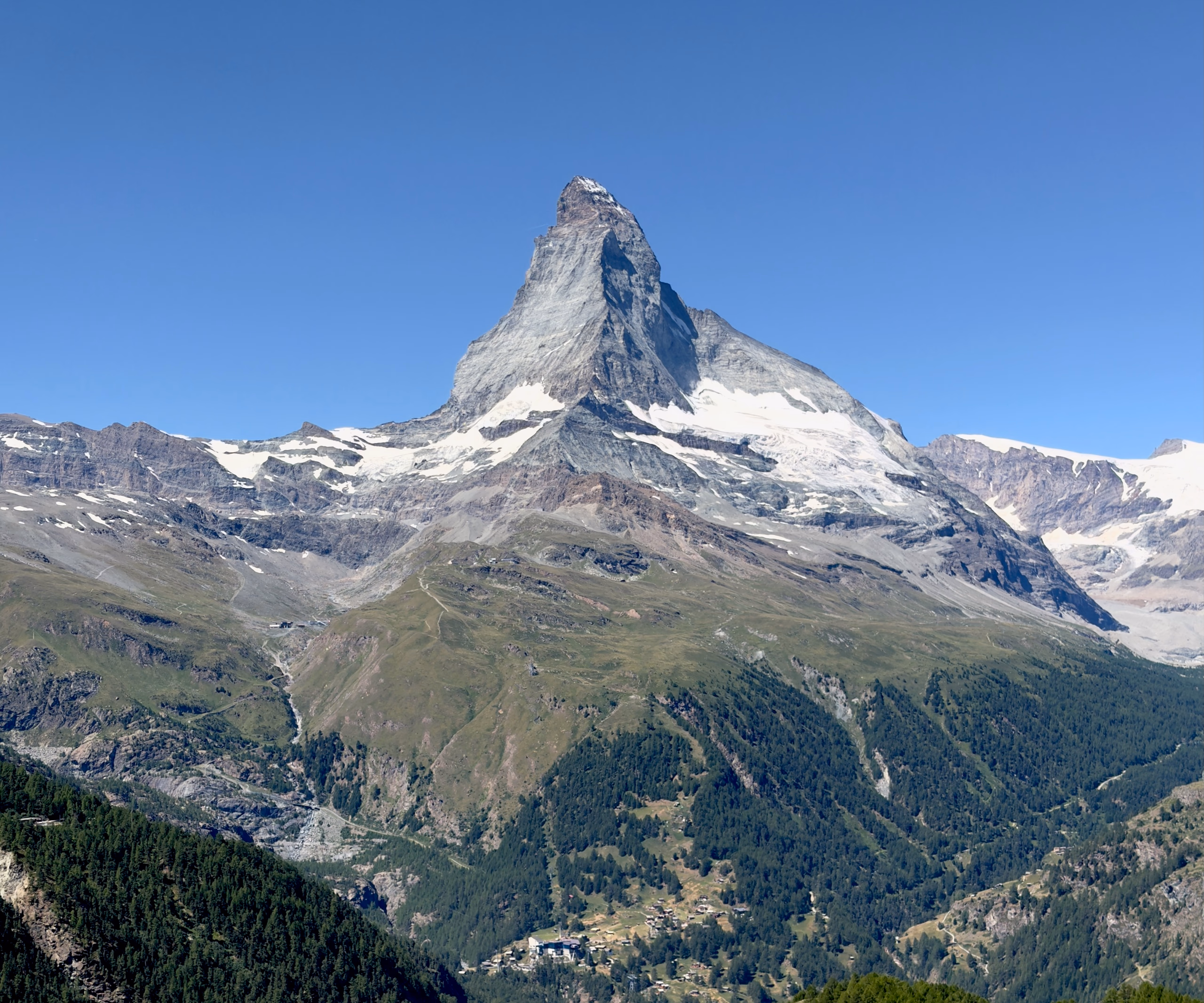 The Matterhorn, its name meaning “meadow peak”, rises like a horn above the alpine pastures of Zermatt.