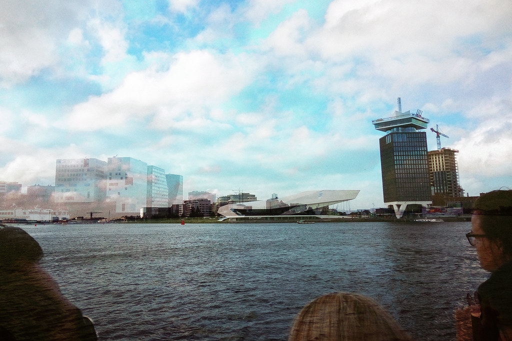 Double exposure of Amsterdam waterfront, Eye Filmmuseum and overcast sky, Netherlands