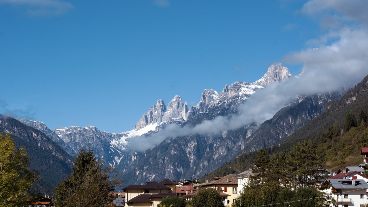 Vertical rock towers against clear alpine sky, Dolomites, Cortina d'Ampezzo, 2024, digital photography