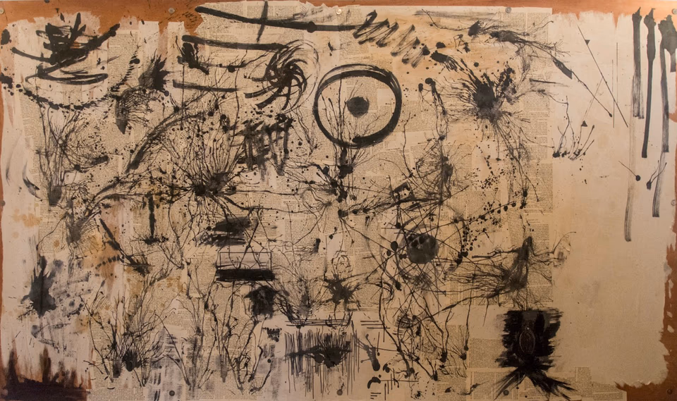 abstract dark and moody mural, consisting of multiple scenery on one mural, using a variety of black ink, upcycled printed paper and against a plywood back, 2016