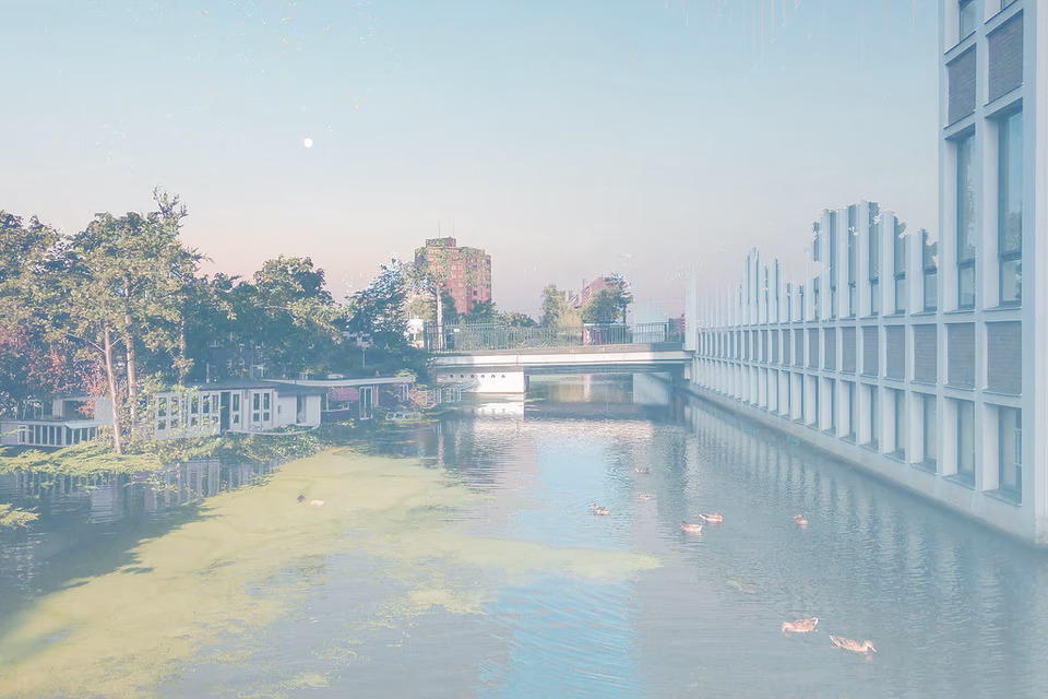 Double exposure of Amsterdam canal and modern bridge railing, soft light, digital collage"