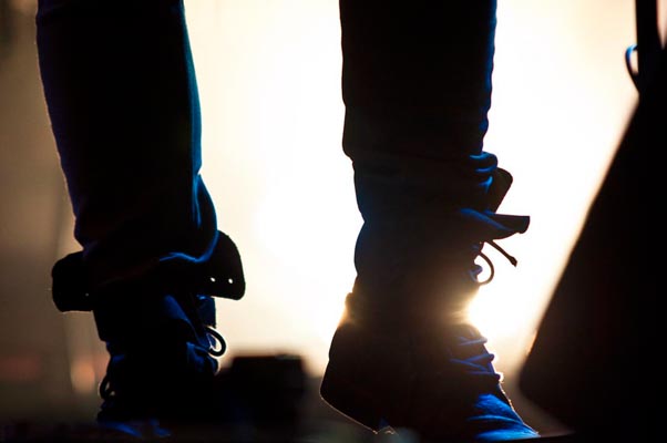 Low angle stage view, performer's feet and backlight, Airport Impressions, Beland Festival, Malta